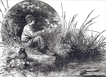 Un jeune garçon pêchant