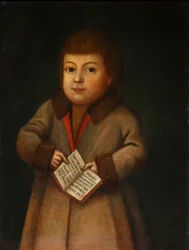 Garçon avec un livre d