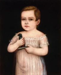 Enfant avec un perroquet jouet