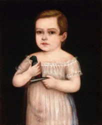 Enfant avec perroquet jouet