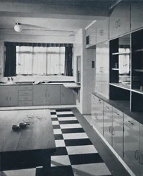 R. W. Symonds et partenaire, L. & A.R.I.B.A. - Cuisine : Équipements cellulaires couleur mastic, inox