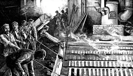 Taper un haut fourneau et couler du fer en gueuses, vers 1900