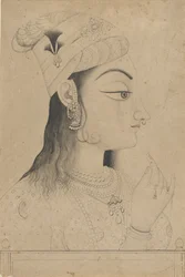 Femme avec un turban habillée en Radha