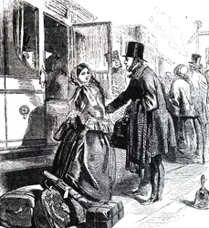 Un père et sa fille montant dans un train.