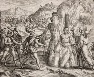 Description des crimes infligés aux Indiens par les colons espagnols - Conquistadors brûlant sur le bûcher un Indien qui a refusé de se convertir à la foi catholique. Religieux de l