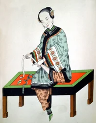 Jeune chinoise bandant ses pieds