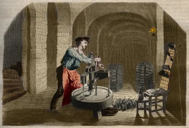 Fabrication du vin de Champagne pétillant : machine à embouteiller utilisée dans une cave. Gravure de 1858 dans « Le Musée Des Sciences »