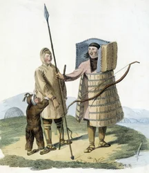 Homme russe en tenue de chasse avec sa femme et son enfant