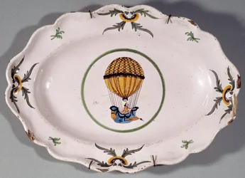 Assiette en faïence décorée de la représentation d