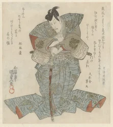 Seigneur debout en kimono bleu