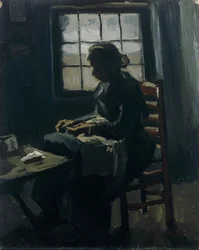 Femme cousant