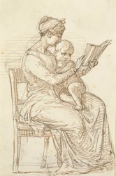 Femme assise montrant un livre à un petit enfant