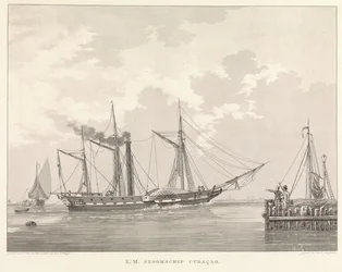 Bateau à vapeur à roues à un quai