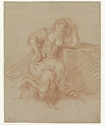 Femme assise dans une pose lascive