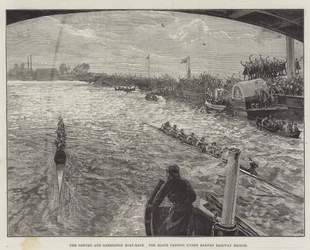 La course de bateaux Oxford et Cambridge, les bateaux passant sous le pont ferroviaire de Barnes