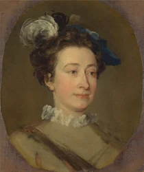 Fille avec un chapeau à plumes