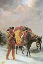 Trappeur de fourrures traversant les montagnes