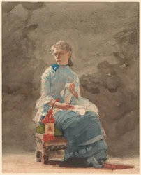 Jeune femme en train de coudre